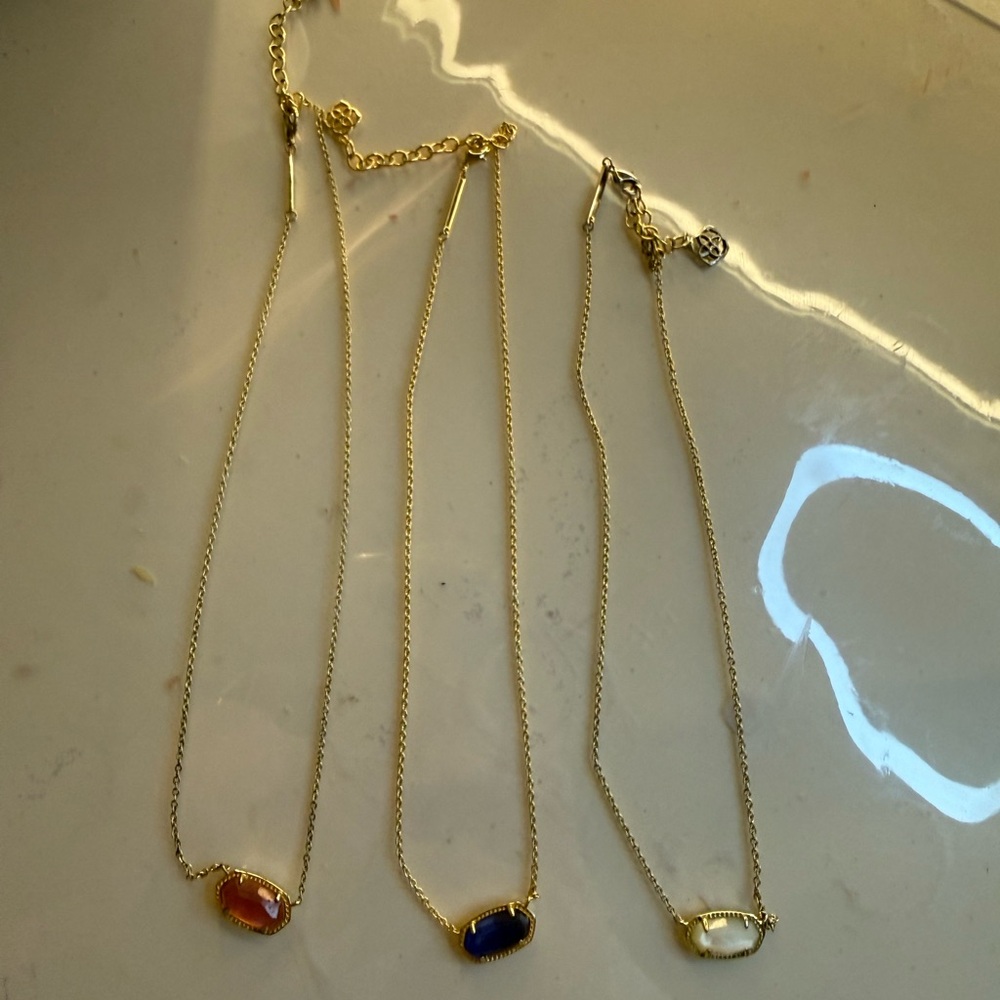 Kendra Scott gold necklaces (pink, blue, white)